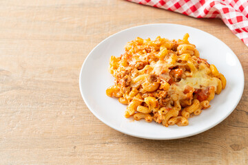 homemade macaroni bolognese with cheese