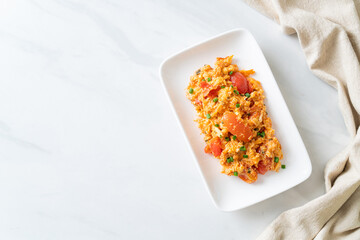 Stir-fried tomatoes with egg or Scrambled eggs with tomatoes