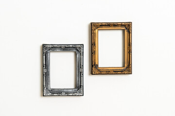 empty picture frame on white wall background