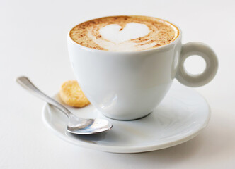 Coffee cup, latte and art in restaurant creativity, customer service and hospitality or food industry background. Cafe shop, closeup, espresso drink and inspiration, creative heart design and cream