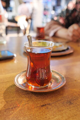 Traditional turkish tea on white table .