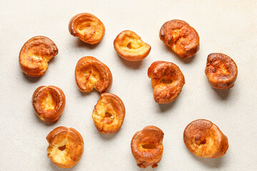 Tasty Yorkshire pudding on light background
