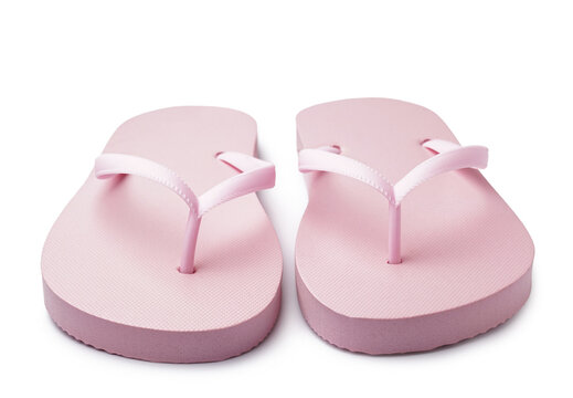 Pair of stylish pink flip-flops on white background