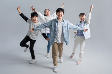 Happy boys and girls cheering