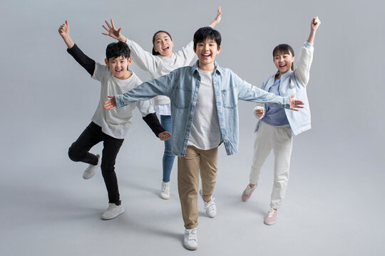 Happy boys and girls cheering