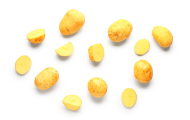 Slices of raw baby potatoes on white background