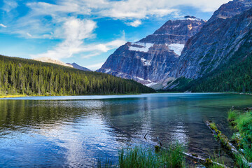 Cavell lake at the base of Mount Edith Cavell in the soft fading light of the evening near Jasper in the Canada rockies