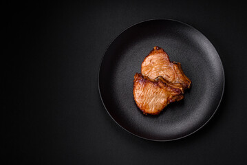 Delicious juicy pork or beef steak with salt, spices and herbs