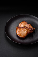Delicious juicy pork or beef steak with salt, spices and herbs