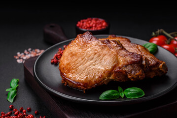 Delicious juicy pork or beef steak with salt, spices and herbs