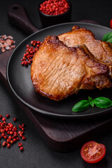 Delicious juicy pork or beef steak with salt, spices and herbs