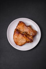 Delicious juicy pork or beef steak with salt, spices and herbs