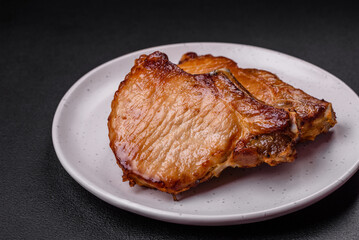 Delicious juicy pork or beef steak with salt, spices and herbs