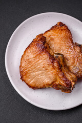 Delicious juicy pork or beef steak with salt, spices and herbs