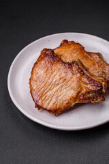 Delicious juicy pork or beef steak with salt, spices and herbs