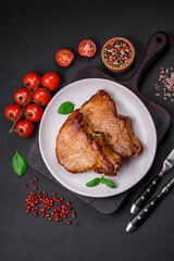 Delicious juicy pork or beef steak with salt, spices and herbs
