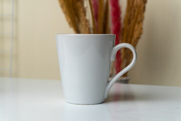 Hot Coffee in White Mug for Refreshment Indoors