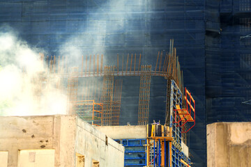 The basis of a building under construction made of metal reinforcement at a construction site
