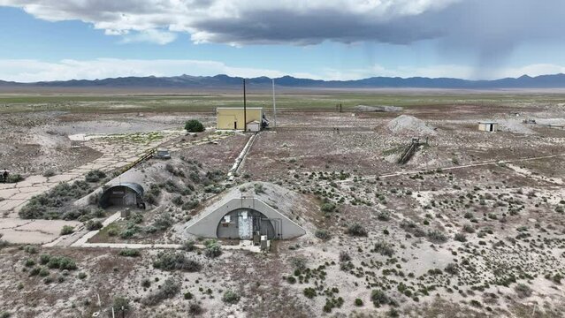 Aerial Tekoi solid fuel rocket motor test area site Utah slide 1. Military solid fuel rocket test facility. Abandoned weapon bunkers and missile buildings. Secret Cold War munitions. Nuclear missile.