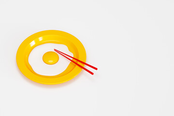 目玉焼きが乗った黄色い皿の3Dイラスト