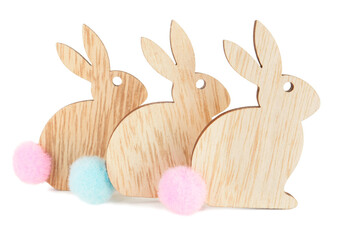 Wooden Easter bunnies on white background
