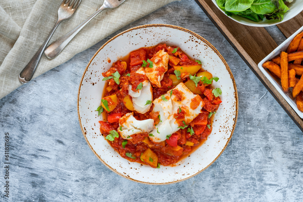 Canvas Prints sicilian fish with pepper sauce and sweet potato chips