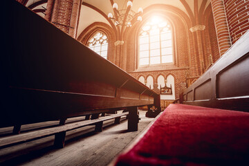 Rows of church benches at the old european catholic church.