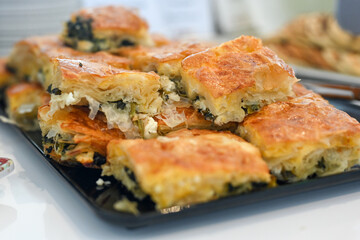 Bakery .Home made  cheese pie  with phyllo pastry, feta cheese,spinach  and organic eggs. Bulgarian banitsa
