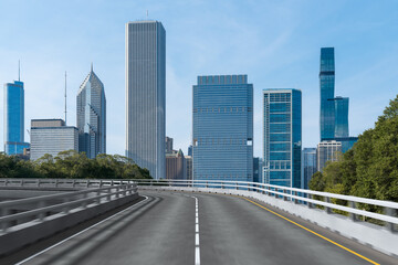 Empty urban asphalt road exterior with city buildings background. New modern highway concrete construction. Concept of way to success. Transportation logistic industry fast delivery. Chicago. USA.