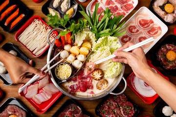 Get Your Taste with Hotpot Cuisine, Shabushi Food. Family time with buffet food © kitbordin