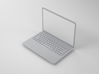 Open grey laptop on a light background