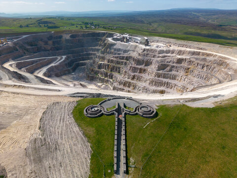 This aerial drone photo shows a large stone quarry in Yorkshire Dales National Park. This stone mine is named Coldstones Cut and is a famous landmark in this beautiful area in England. 