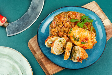 Baked squids stuffed with rice.
