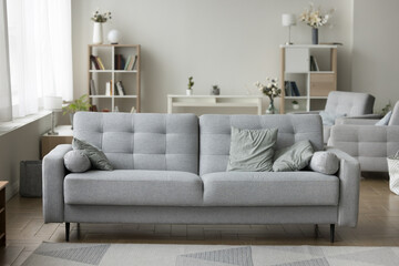 Stylish Scandinavian interior with decoration in pale colors. Modern living room with no people,...