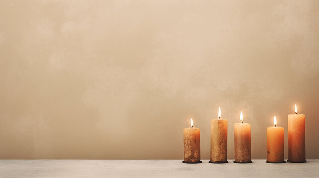 a row of burning candles on a warm background festive background, empty copy space. Generative AI