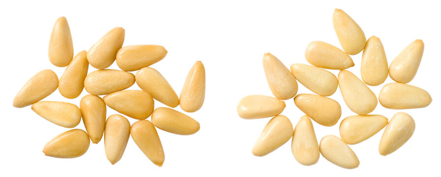 Roasted pine nuts isolated on the white background, top view.