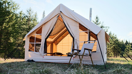 Camping tent under the pine forest. Inflatable tent © Sergey Kalsin