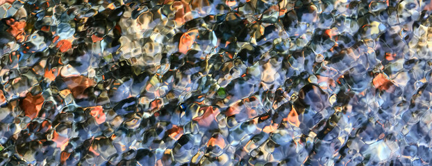 transparent water stones on the bottom multicolor abstract pattern