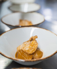 View of a serving of fish dishes in a restaurant kitchen.