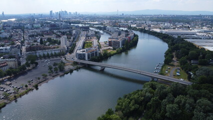 Obraz premium A section of the city Offenbach, where Carl-Ulrich bridge connects the two Main river banks.