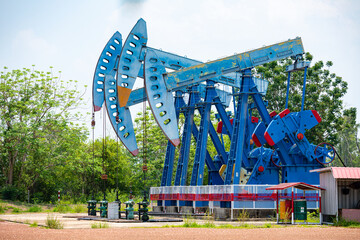 In the field country crude oil industry the oil rig pump in the evening of the pumping