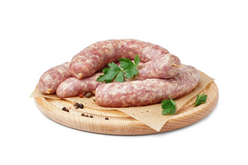 Board with raw fresh sausages and spices on white background