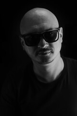 Man in sunglasses, black and white portrait