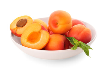 Bowl with ripe apricots isolated on white background