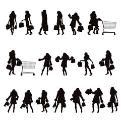 Set of vector silhouettes of shopping women on white background.
