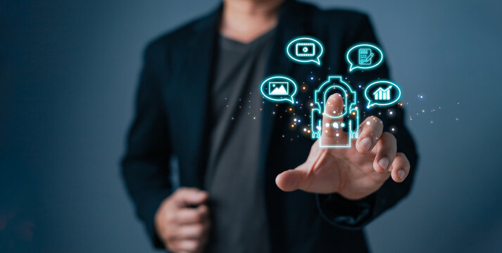 man touch bot icon and command prompt ai chat ability to create photos,compose song and novels,make videos,stock trading,ai disruption in many professions.Digital Artificial Intelligence technologfy