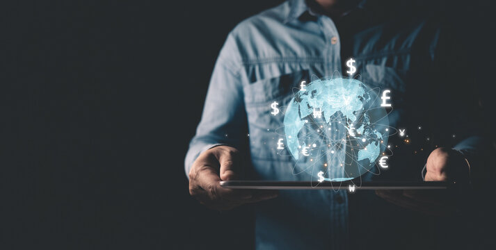 A person use tablet and global currency to plan in e-business, the use of online digital network technology in business, buying and selling commerce online digital marketplace