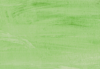 Abstract background. Brushes of light green paint on paper