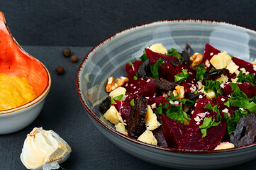 Vegetable vegan salad with beets and nuts.