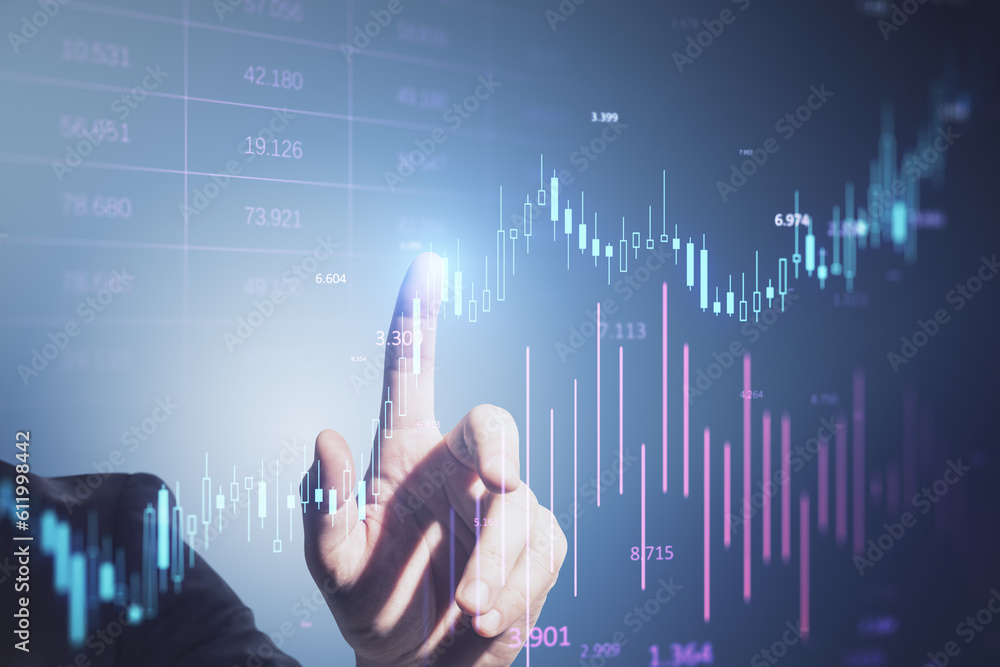 Poster close up of businessman hand pointing at glowing candlestick forex chart and index bar on blurry bac